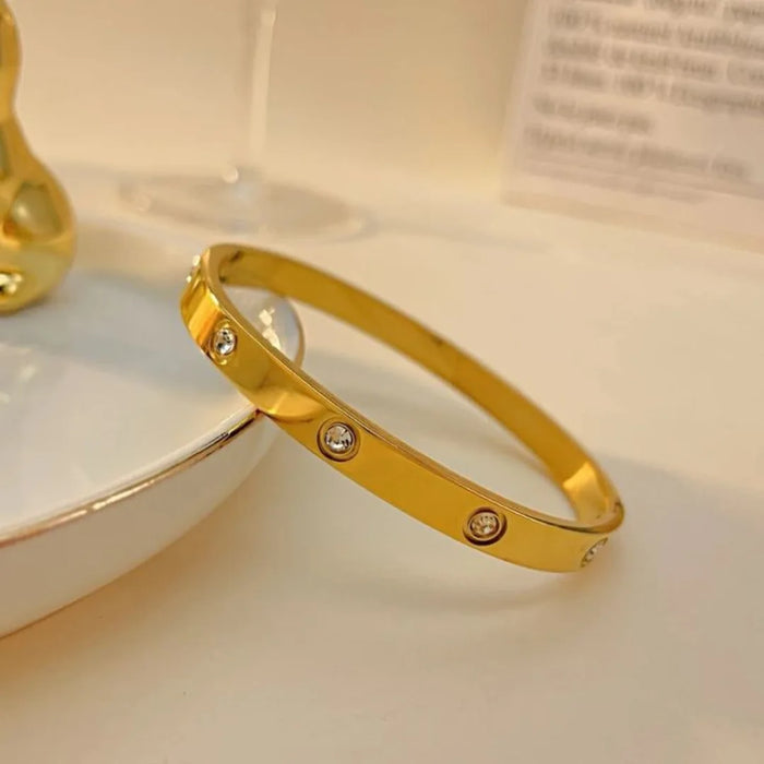 Gold Screw Motif Bangle Stack Collection