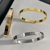 Gold Screw Motif Bangle Stack Collection