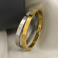Screw Motif Oval Bangle Bracelet