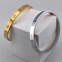Screw Motif Oval Bangle Bracelet