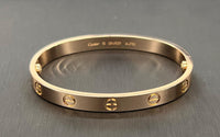 Classic Rose Gold Screw Motif Bangle