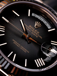Rolex Day-Date 40 Everose Gold | Black Roman Dial