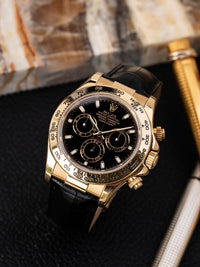 Rolex Cosmograph Daytona 18k Yellow Gold — Black Dial on Leather Strap