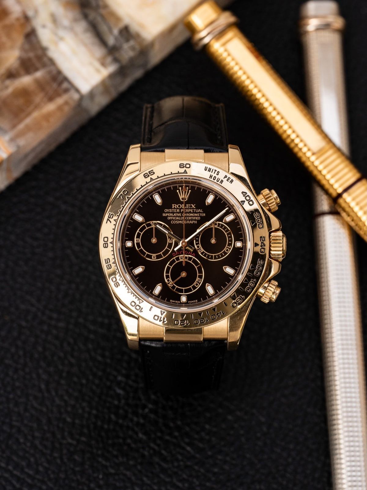 Rolex Cosmograph Daytona 18k Yellow Gold — Black Dial on Leather Strap